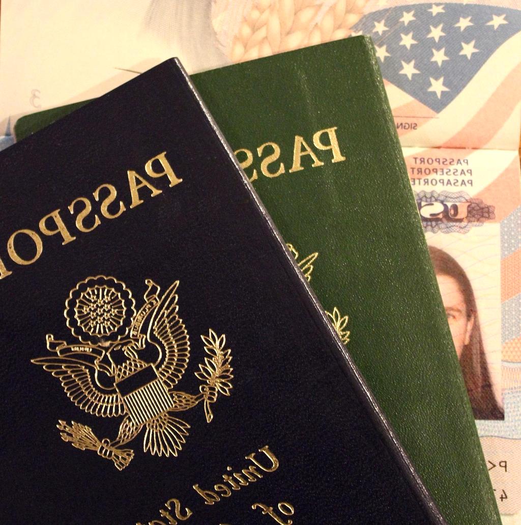 Travel service concept with suitcase and passport